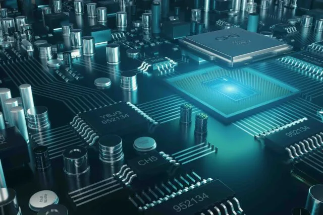 Close-up of motherboard with glowing CPU chip